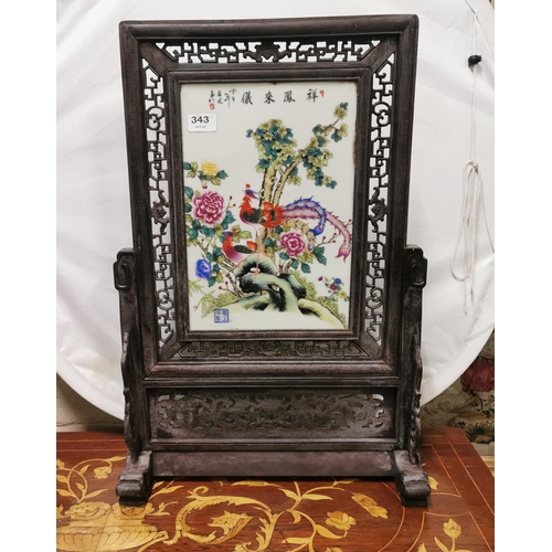 343 - Oriental Adjustable Porcelain fronted Screen in a carved teak stand, decorated with a Chinese floral... 