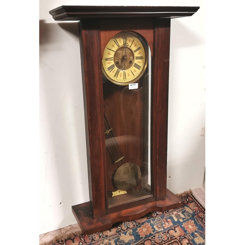 477 - Spring Drive Vienna Wall Clock, walnut case, enamelled dial, with a key 82cmH