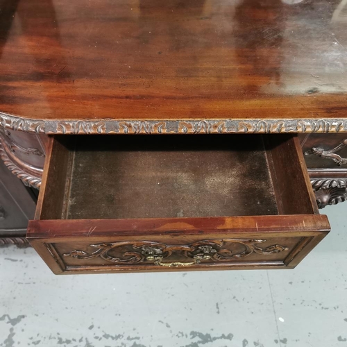 57 - Late 19thC Large Mahogany Sideboard, a shell shaped pediment to the mirrored back, over a pedestal b... 