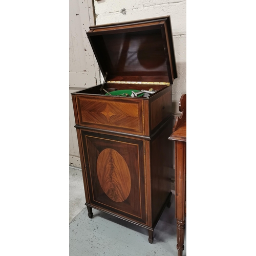 58 - Inlaid Mahogany Gramophone Cabinet, the hinged lid opening to a record player, above a single door, ... 