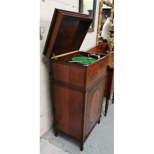 58 - Inlaid Mahogany Gramophone Cabinet, the hinged lid opening to a record player, above a single door, ... 