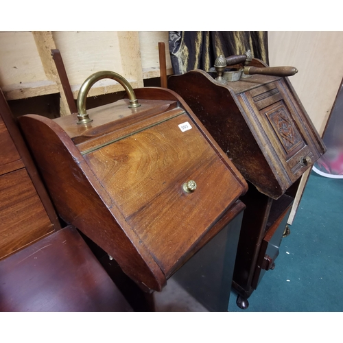 593 - Walnut coal scuttle with brass carrying handle & a carved front coal box, 1 shovel (2)