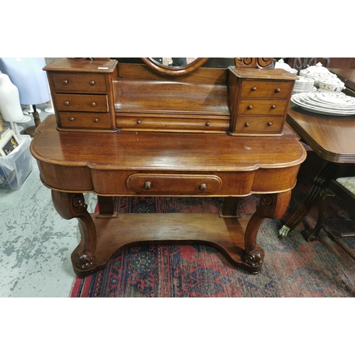 63 - Duchesse Mahogany Dressing Table, on carved cabriole forelegs with adjustable mirror, gallery drawer... 