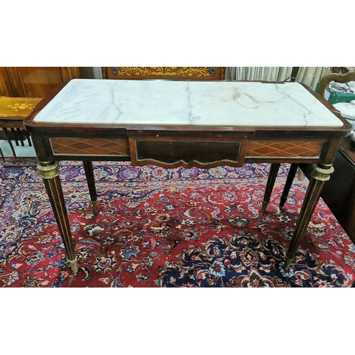 79 - Tall white marble topped and rectangular shaped French Centre Table, on turned legs (some damage to ... 