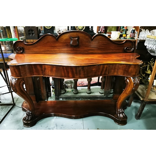 83 - 19thC Mahogany Serpentine Shaped Side Table with apron drawer and shaped gallery featuring an emblem... 