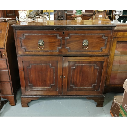 87 - Geo. Mahogany Secretaire Desk, the pull out desk top fitted with small drawers, above 2 cabinet door... 