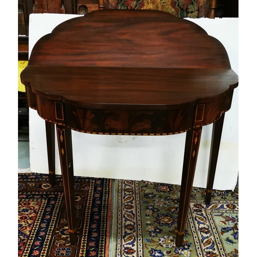 89 - Mahogany Fold-over Tea Table, with inlaid serpentine shaped front, on tapered legs, 91cmW