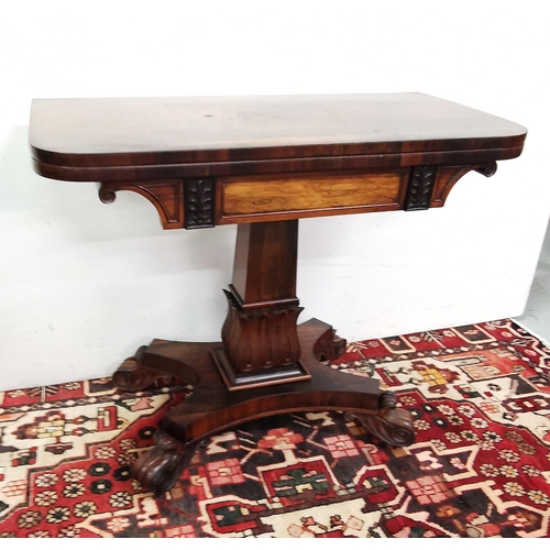 93 - Regency Rosewood Card Table, with a fold-over top, acanthas mouldings to the frieze and supporting p... 