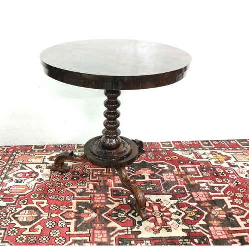 96 - 19thC Continental Rosewood Centre Table, a circular top over a bobbin shaped pod, 3 ornately scrolle... 