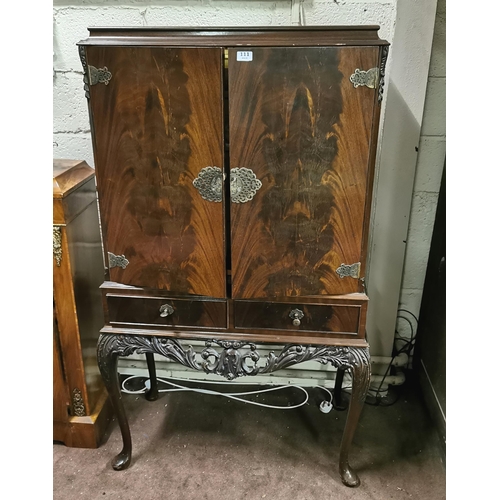 111 - Mid-20thC Walnut Cased Cocktail Cabinet, the two doors opening to a maple coloured finished, mirrore... 