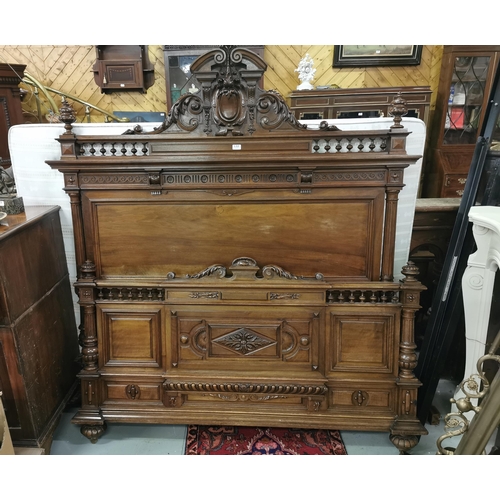 132 - Finely Carved King Size (5ft wide) Mahogany Bedstead, featuring moulded panels and turned legs (labe... 