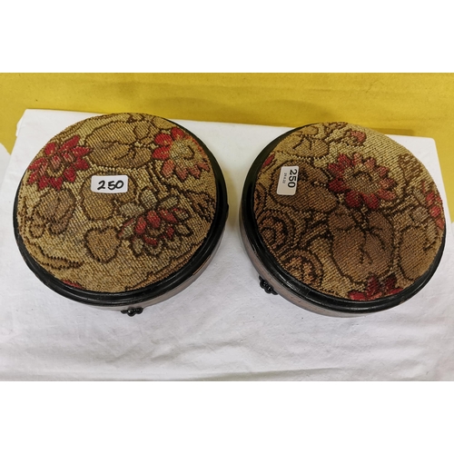 250 - Matching Pair of circular walnut framed Footstools, floral tapestry tops, on glass feet, 28cm dia