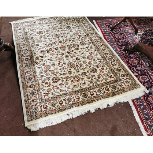 378 - Kashmir Floor Rug, cream ground with red floral pattern, 1.2m x 1.7m