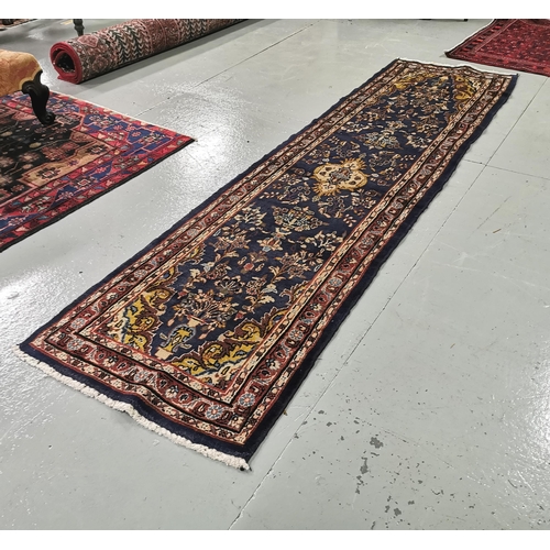 363 - Persian Floor Runner, 3m x 0.85  deep blue pattern, with multiple vase designs