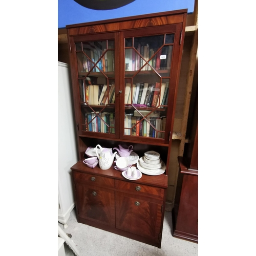 601 - 1960s Teak Finish Bookcase  2 glazed doors over a cabinet below, 1.95H x 0.92cmW