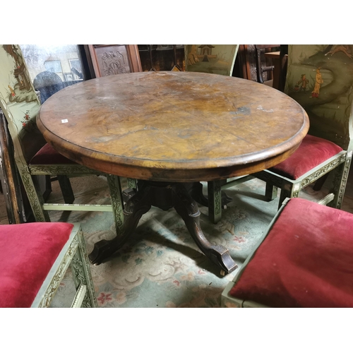 604 - Oval walnut centre table on 4-legged pod, for restoration