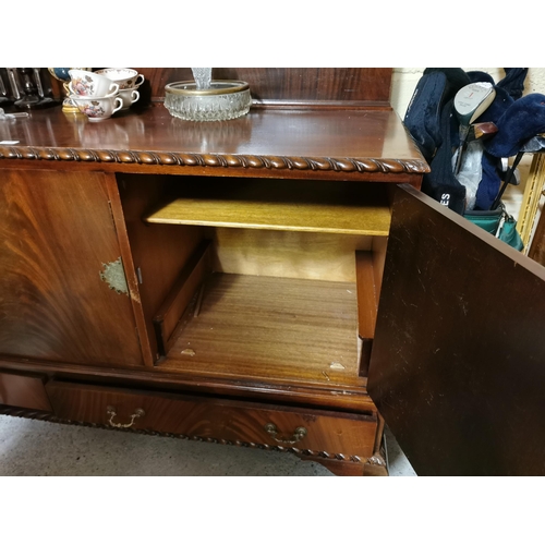 602 - Large 1980s Mahogany Sideboard with a gallery back over 3 doors enclosing shelves  (exterior brass ... 