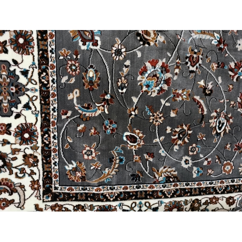 386 - Silver grey ground full pile Iranian Carpet, all over floral pattern 2m x 3m