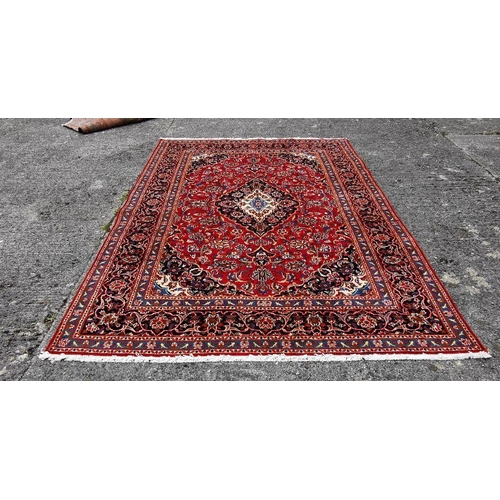 379 - Rich Red Ground Fine Woven Persian Kashan Carpet, traditional floral Kashan design, with tones of gr... 