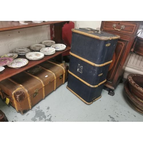 322 - Two Steamer Trunks, brown and blue ply with wooden bands  & a Vintage red Antler suitcase (3)