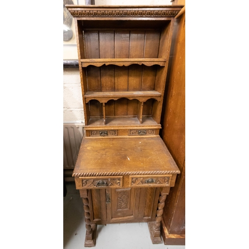 105 - Compact Continental Oak Sloped Desk with drawers, open shelving above (worn condition), 59cmW x 46cm... 