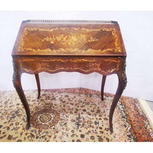 121 - 19thC French Walnut Bureau de Dame, marquetry inlaid, with a fitted interior and brass gallery, on c... 