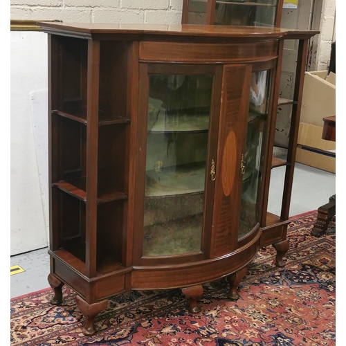 129 - Edw. Inlaid Mahogany Display Cabinet, with two bowed glass doors between two open 2 tier shelves on ... 