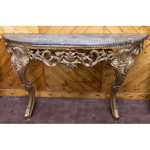 136 - Carved Gilt Consol Table, bowfront shaped, with a decorative fretwork frieze, dark green marble top,... 