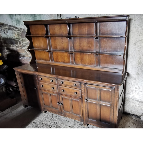 59 - Ercol Dresser, large sized, an open style top over 4 drawers and 4 cupboards, 2.15mW x 0.6D x 1.8mH