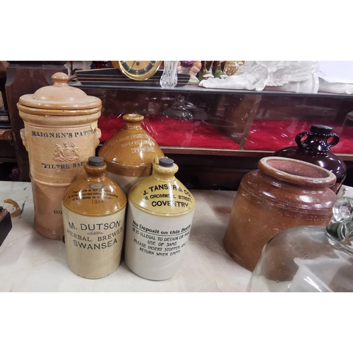 608 - 3 Stoneware Whiskey Jars & a (damaged) water filter (4)