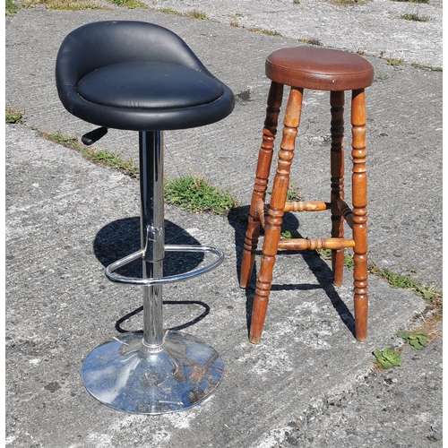 629 - Three bar stools - 1 high,1 low and a black leatherette covered bar stool on a chrome base (3)