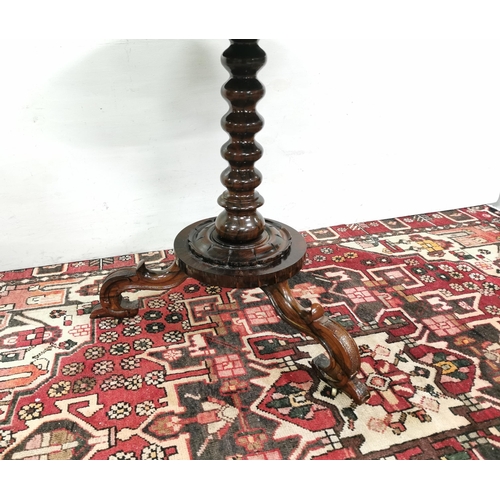 75 - 19thC Continental Rosewood Centre Table, a circular top over a bobbin shaped pod, 3 ornately scrolle... 