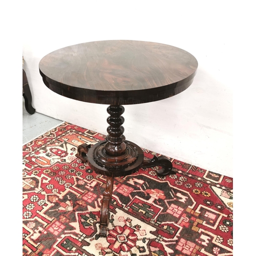 75 - 19thC Continental Rosewood Centre Table, a circular top over a bobbin shaped pod, 3 ornately scrolle... 