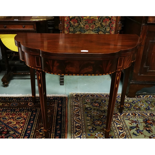 76 - Mahogany Fold-over Tea Table, with inlaid serpentine shaped front, on tapered legs, 91cmW