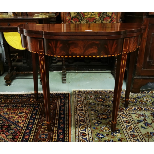 76 - Mahogany Fold-over Tea Table, with inlaid serpentine shaped front, on tapered legs, 91cmW