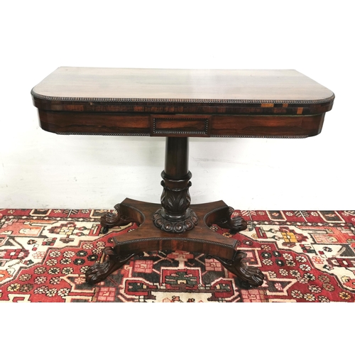 77 - Regency Rosewood Tea Table, with a fold-over top, beaded rim and egg and dart mouldings to the suppo... 