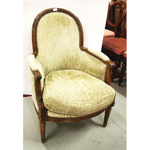 8 - Walnut framed Armchair, with a curved back, on turned front and back legs, covered with cream/green ... 