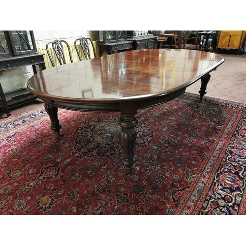 83 - Victorian Mahogany Dining Room / Boardroom Table, with oval shaped ends, on turned and reeded bulbou... 