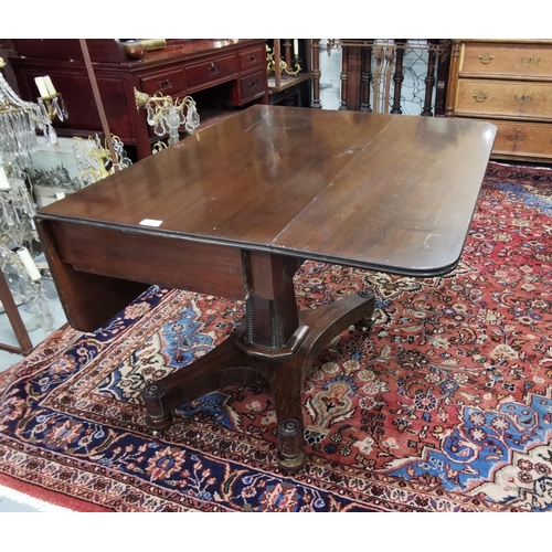 134 - WMIV Mahogany Pembroke Table, with drop ends and apron drawer, on a platform base of 4 splayed legs,... 