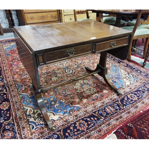 135 - Regency style Mahogany Sofa Table with two apron drawers, on 4 splayed legs, brass toes and castors,... 