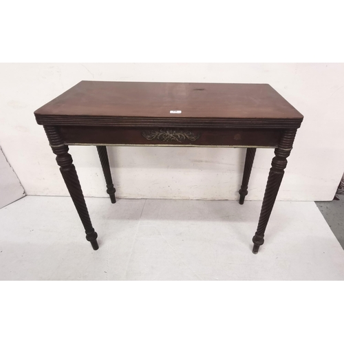 78 - WMIV mahogany fold-over Tea Table, on barley twist front legs, brass beading and applique to the apr... 