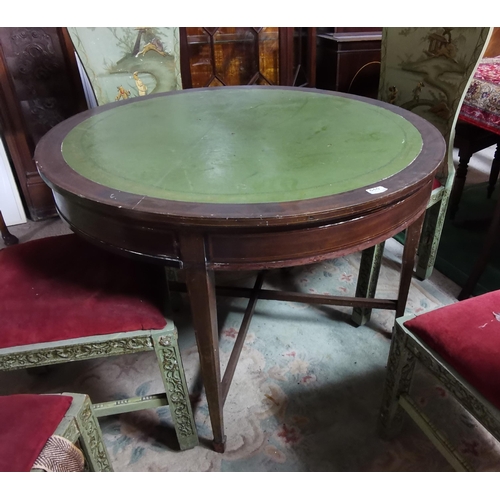 640 - Round Inlaid Mahogany Writing Table, on tapered legs, green leatherette covered top, 106cm Dia