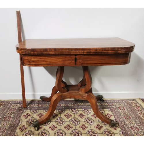 100 - 19thC Mahogany Tea Table, foldover style, on a lyre shaped pod above 4 splayed legs, decorative bras... 