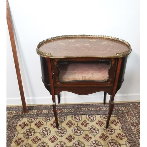 101 - Inlaid mahogany Occasional Table/Cabinet, with a kidney shaped top and brass gallery, on sabre legs,... 