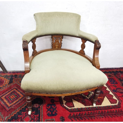 11 - Edw. Rosewood inlaid Sitting Room Armchair, on turned front legs, porcelain castors, green velour he... 