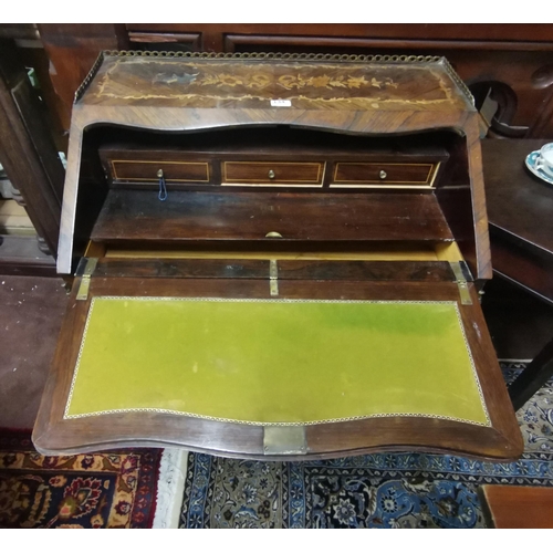 134 - 19thC French Walnut Bureau de Dame, marquetry inlaid, with a fitted interior and brass gallery, on c... 