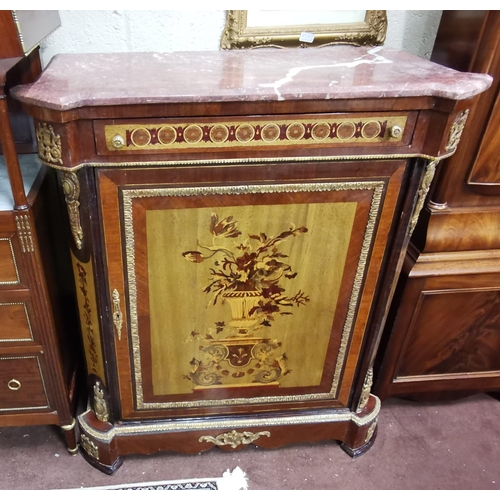 140 - Parquetry Inlaid Pier Cabinet, the red marble top with canted corners, over a single door, inlaid wi... 