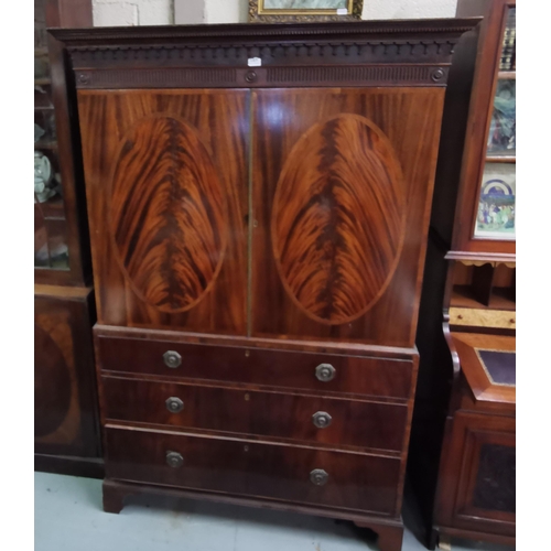 167 - Georgian Mahogany Linen Press, the decorative multiple cornice over two doors enclosing a hanging cl... 