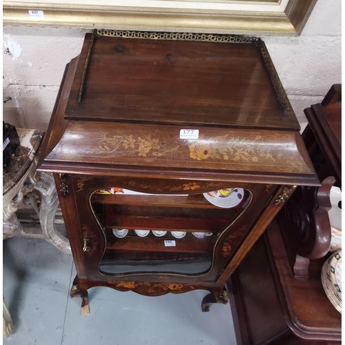 177 - Late Victorian Ornately inlaid single door Mahogany Vitrine on sabre legs, gilt mounts and a brass g... 