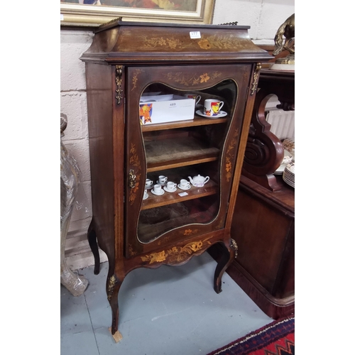 177 - Late Victorian Ornately inlaid single door Mahogany Vitrine on sabre legs, gilt mounts and a brass g... 